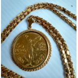 A Mexico 1923 50 Pesos 37.5g pure gold coin on a .750 ct gold mount and chain, hallmarked. Gross