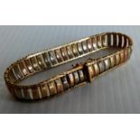 A ladies 9ct tri-colour gold bracelet with import marks for Sheffield, 19cm, 20.82g