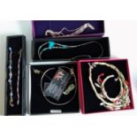 A collection of five silver bracelets and necklaces with various decoration, all boxes (5)