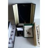 Three silver necklaces with various decoration, a gemstone bracelet and silver pendant, all boxed