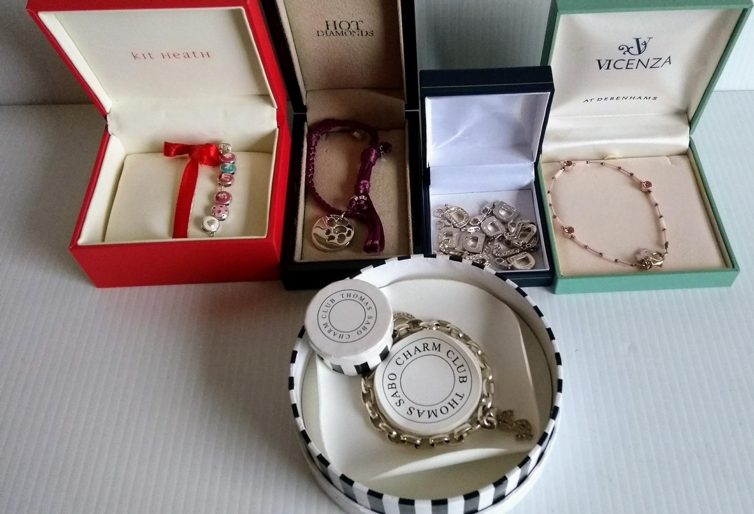 A collection of five silver set bracelets plus 15-silver Thomas Sabo charm letters