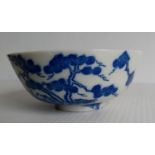 An eighteenth century Chinese blue on white tea bowl with indistinct mark to base, 5 cm x 11