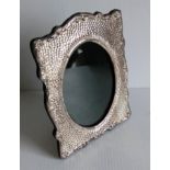 A Birmingham silver oval photo frame with hammered texture, 13 cm H, 1998