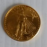 A 1993 1/2 ounce $25 American Gold Eagle coin 17.07g, 27 mm