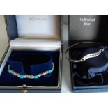 A silver bracelet set with turquoise and diamonds in a Goldsmiths box and another smaller silver