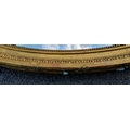 An Edwardian oval gilt-framed wall mirror, 110 x 80 cm. Condition: repair / filler to one side ( - Bild 3 aus 4