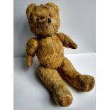 A vintage musical Teddy with Thorens tag, in working order, 46 cm