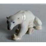 A Bing & Grondahl polar bear figurine numbered, 2217 and a Royal Copenhagen figurine bear 3014 by