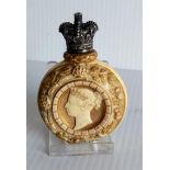 A Royal Worcester Queen Victoria 1887 commemorative scent bottle with portrait relief to one side,