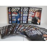 A collection of approximately sixty-two James Bond 007 die cast toy cars with collectors