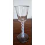 A Georgian cordial glass, with bucket shaped bowl, on multi spiral air twist stem, 15.5cm H