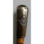 A WW1 Royal Flying Corps swagger stick with bamboo shaft, thimble-pattern nickel top embossed with a