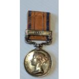 A South Africa Service Medal with 1879 clasp awarded to 1236 PTE. J. WYNN 94th FOOT. with ribbon