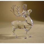 A boxed Swarovski reindeer crystal figurine, without damage or repair