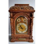 A 19th century German oak-cased three-train bracket clock by Winterhalder & Hofmeier, circa 1880,