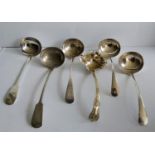 A Victorian Elkington silver plated soup ladle and five others from 29 to 32 cm with assorted