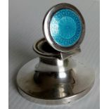 An Edwardian silver capstan with guilloche enamel decoration to lid, glass liner (tiny nibble) by