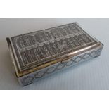 A Iranian silver presentation cigarette box with Herati allegorical etched decoration on bracket