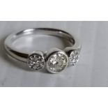 An 18ct white gold ring with central old-cut diamond, 5mm approximately, estimated to weigh 0.50
