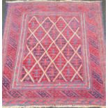 A tribal Kazak hand-knotted wool rug with multicoloured isometric design, 125 x 118 cm in good