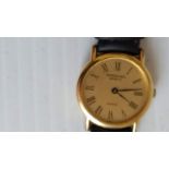 A vintage Raymond Weil Geneve Quartz 18K gold electroplated ladies wristwatch with original strap,