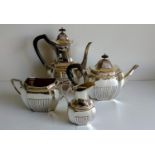 A Victorian silver four-piece tea service comprising coffee jug, teapot, sugar bowl and cream jug