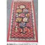 An Oriental-style woven runner from the Daghistan Collection with multi coloured designs, 165 x 80