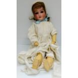 An Armand Marseille 390 A.7.M composition doll with sleeping eyes, 60 cm