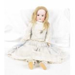A German bisque shoulder doll With long blond wig, open / shut brown eyes, open mouth,