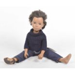 A Sasha Doll With olive skin, short dark hair,