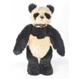 A large Charlie Bears panda CB141415 Wearing collar with bells attached with articulated limbs,