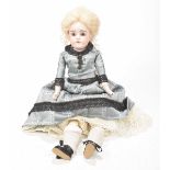 A French style porcelain shoulder doll With blond wig,