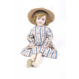 A German bisque headed doll With auburn/brown wig, open/shut blue eyes, open mouth,