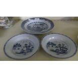 A pair of 19th Century Chinese blue and white circular dishes together with a further blue and