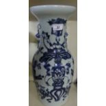 A large Chinese blue and white baluster vase, decorated with floral sprays.