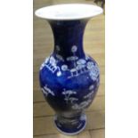 A late 19th/early 20th Century Chinese blue and white baluster vase, decorated with prunus blossom.