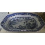 A 19th Century Chinese nanking octagonal bowl, decorated in blue and white with river scene.