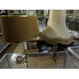 A modern brass two branch table lamp with rope swag detail,