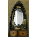 A novelty wall mirror, formed as a boat with two drawer base.