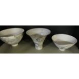 Three pieces of Wied & Diedrik Henning studio pottery bowls, each of conical form,