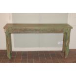 A rustic hardwood painted console table