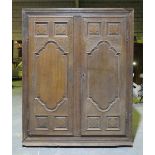 A 19th Century French rustic oak armoire