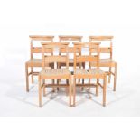 A set of five beechwood chapel chairs