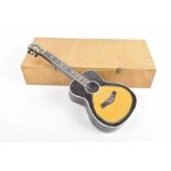 A vintage child's boxed wooden guitar, c