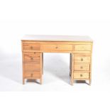 A rustic pine twin pedestal desk