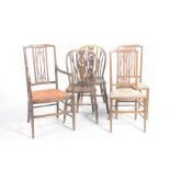 Three Edwardian parlour chairs and two kitchen chairs Including an Edwardian inlaid mahogany elbow