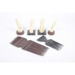 A collection of African items To include two carved hard wood Kenyan Combs, 21cm and 15cm long,