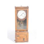 A 1930 oak cased Gledhill-Brook time recorder The punch time clock with a glazed door enclosing a