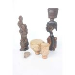 A collection of African collectable items To include a twin terracotta and skin topped drum,