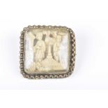 A Chinese carved Canton ivory panel brooch, late 19th Century/early 20th Century Of square section,